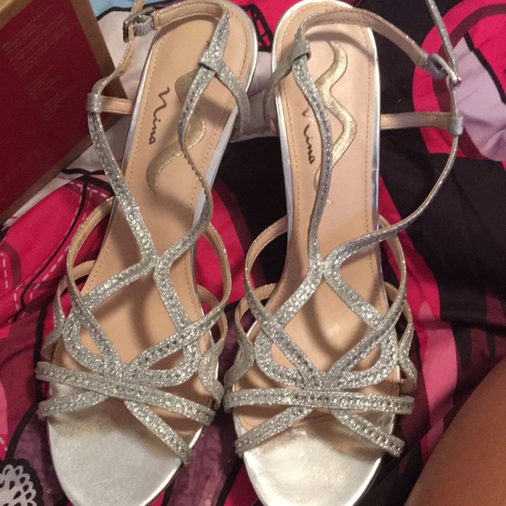 Silver bedazzled Stiletto Heels.